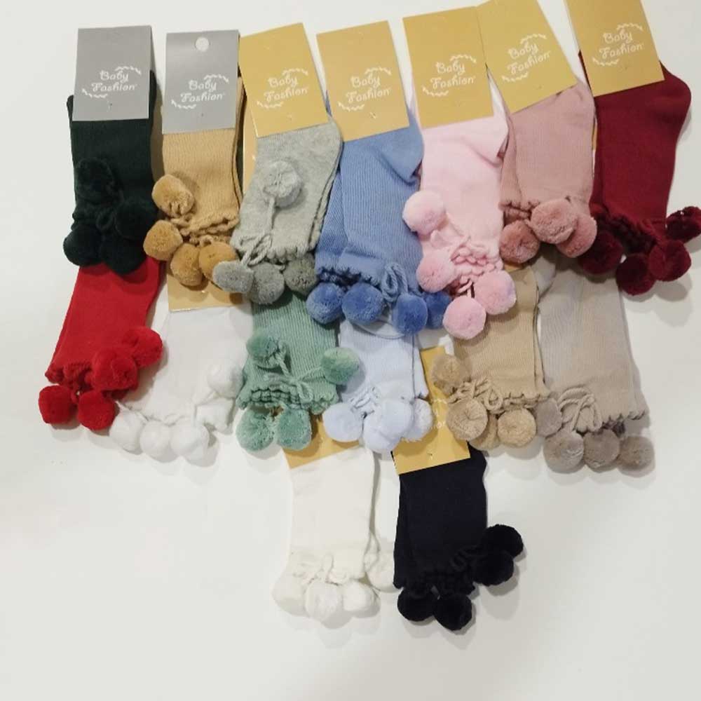 Calcetines altos con pompón bebé Baby Fashion