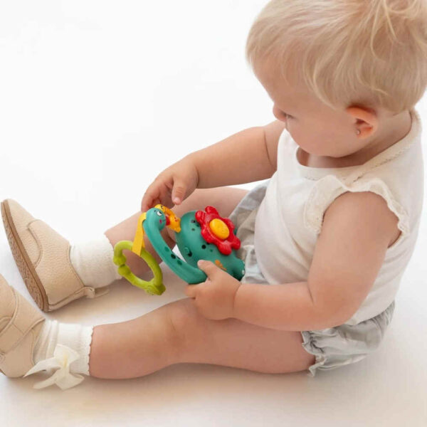 Juguete dinosaurio musical para bebé 16x15cm KioKids