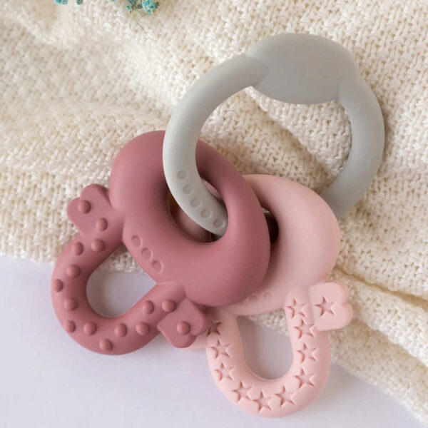 Mordedor de llaves de silicona rosa y gris para bebé KioKids